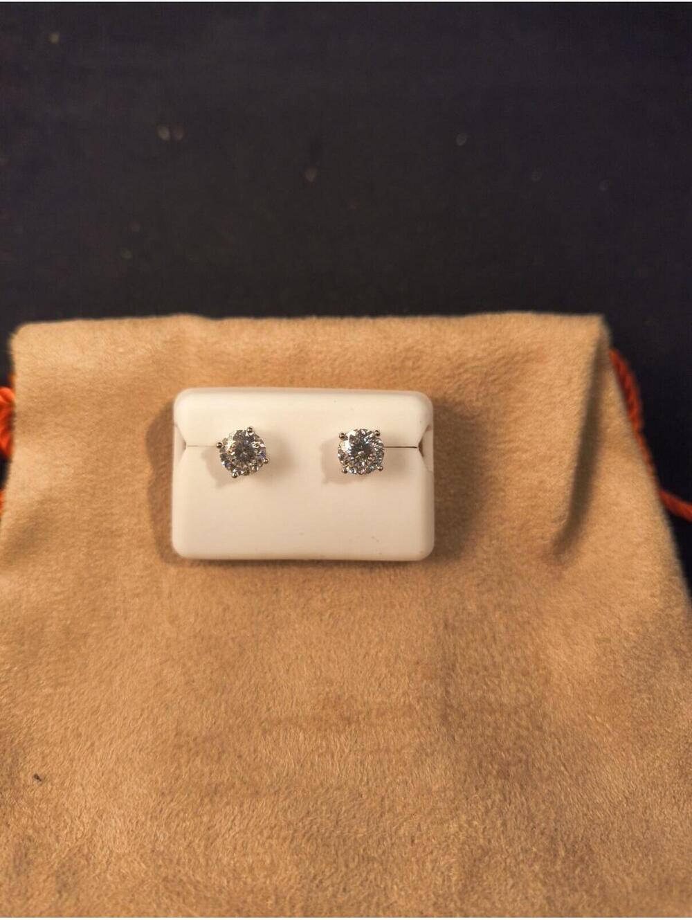 2 CTW Round Moissenite Studs Set In Sterling Silver